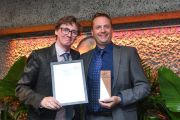 Comedian and broadcaster Ed Byrne (left) presenting MD Charles James from Frank P Matthews.